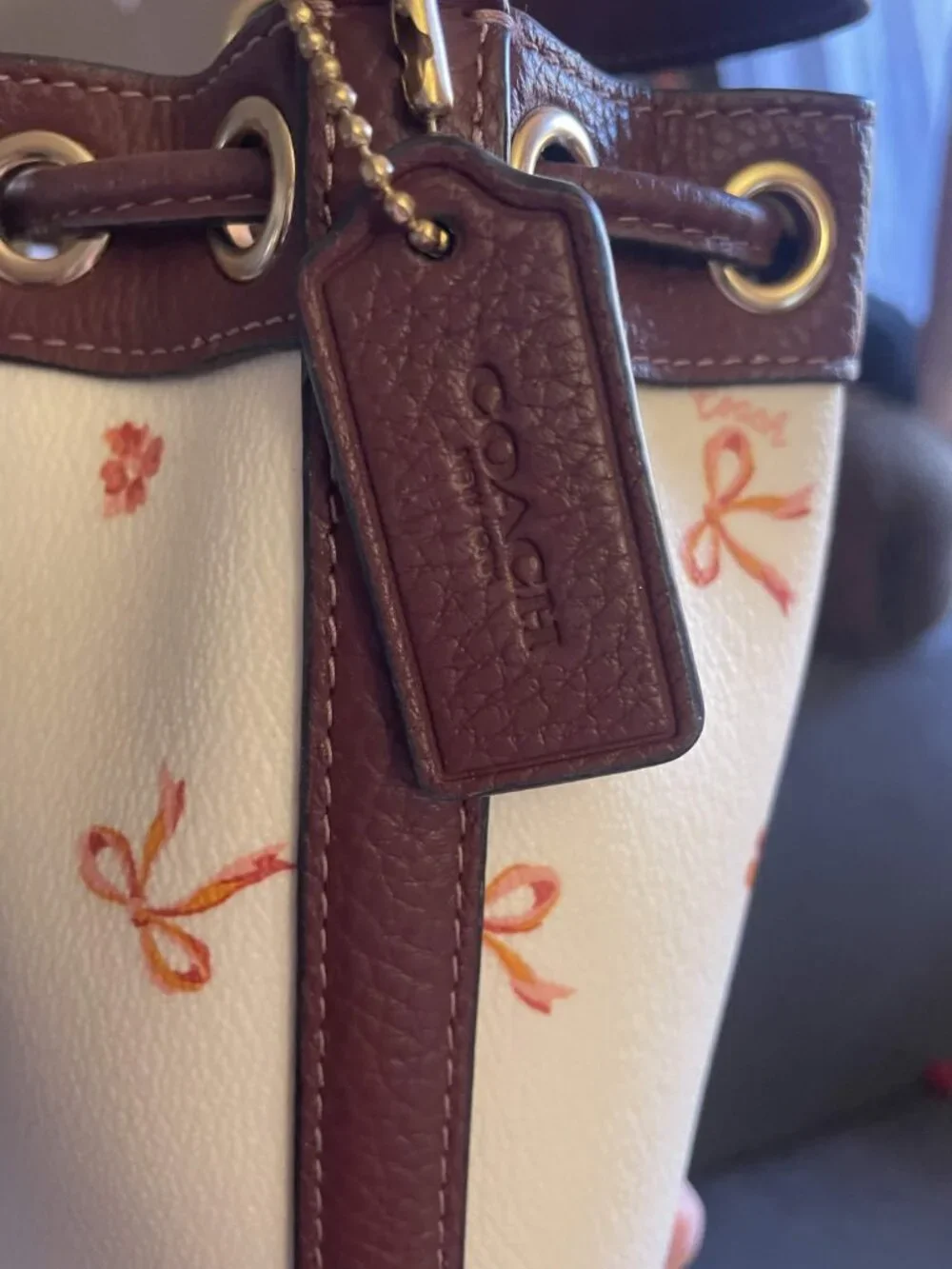 🎀Coach Dempsey Drawstring Bucket Bag With Bow Print~Used~Missing strap🎀
